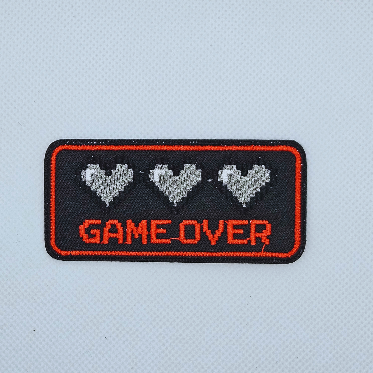 Strijk embleem - Iron on Patch - Game over met hartjes