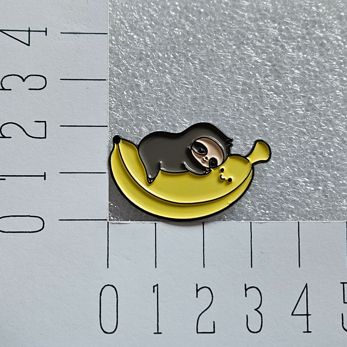 Enamel pin - Luiaard met banaan