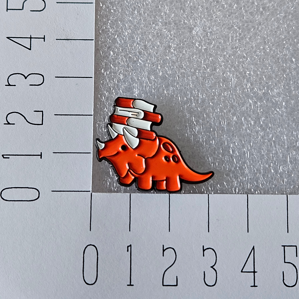 Enamel pin - Dino met boeken