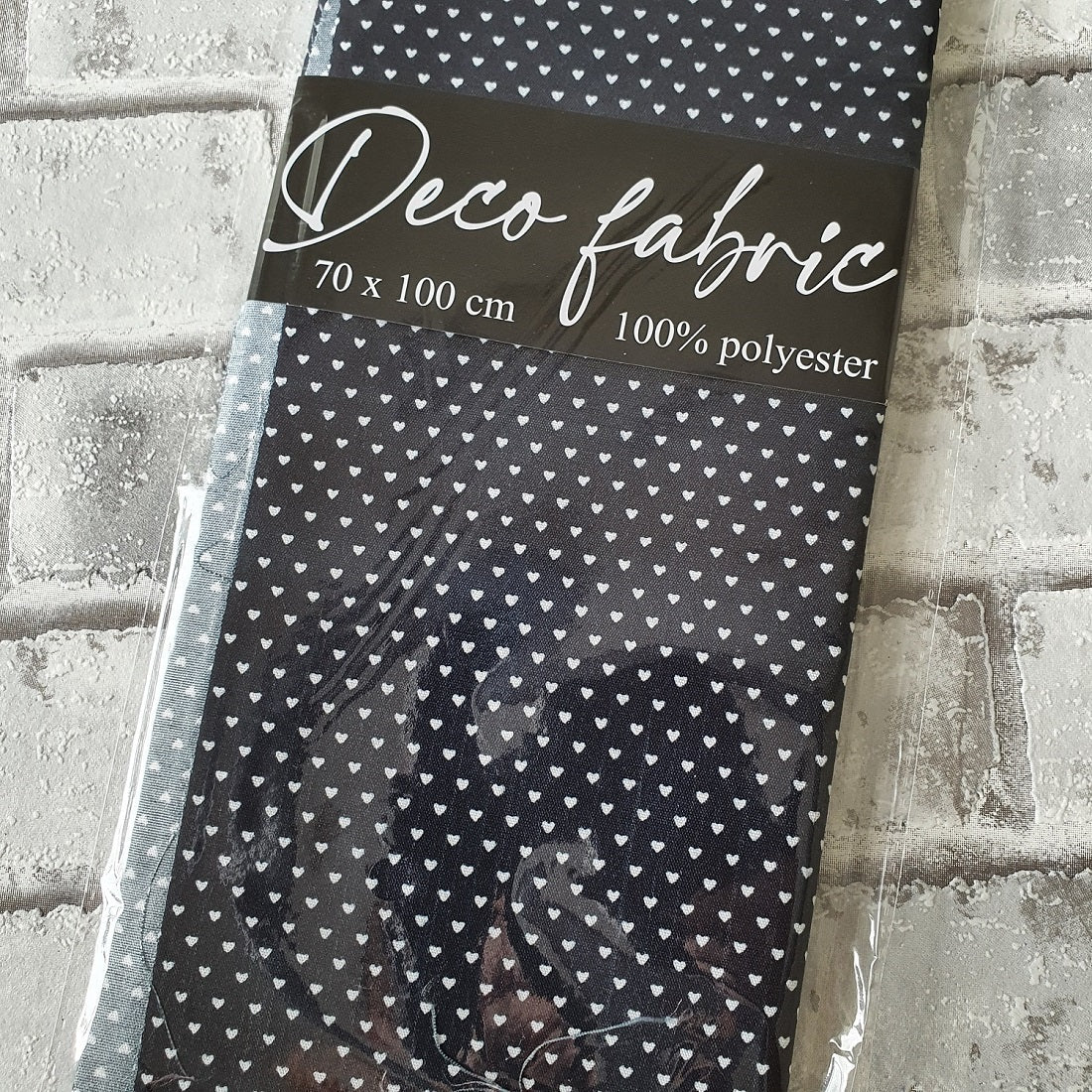 Deco stof - 70 x 100 cm - Zwart met hartjes - Hobby en meer