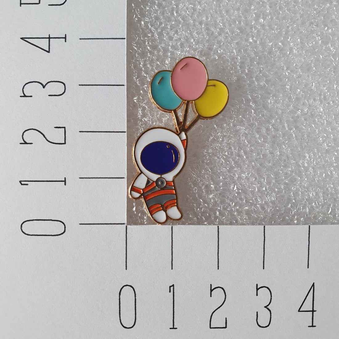 Enamel pin - Astronaut met ballonnen