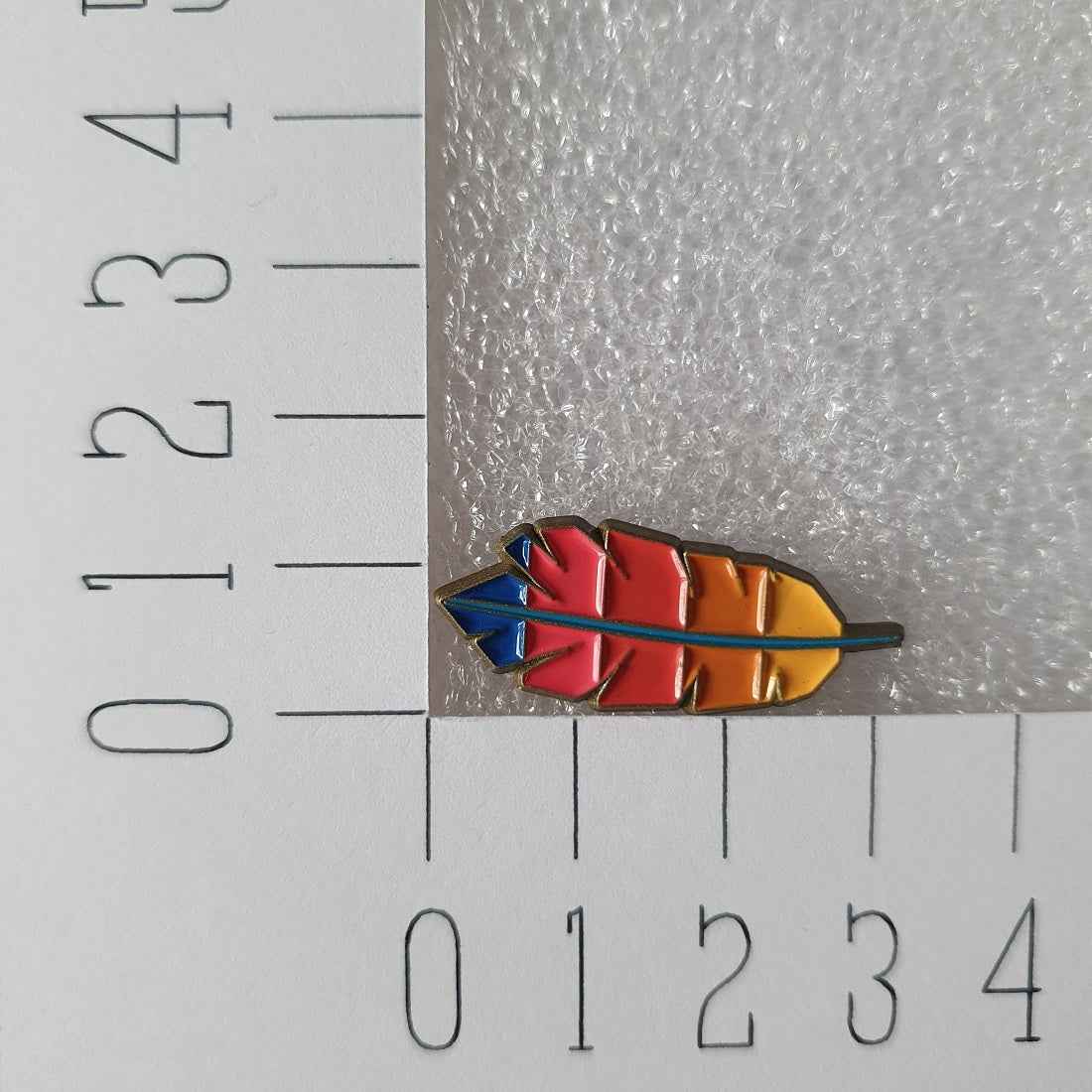 Enamel pin - Regenboog veer