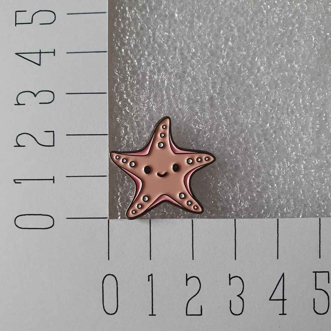 Enamel pin - Zeester