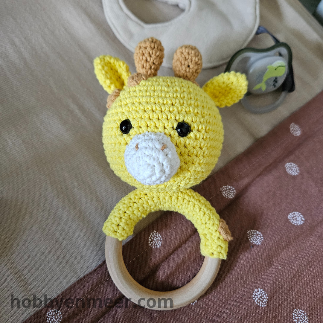 Rammelaar - Giraffe op houten ring - Hobby en meer