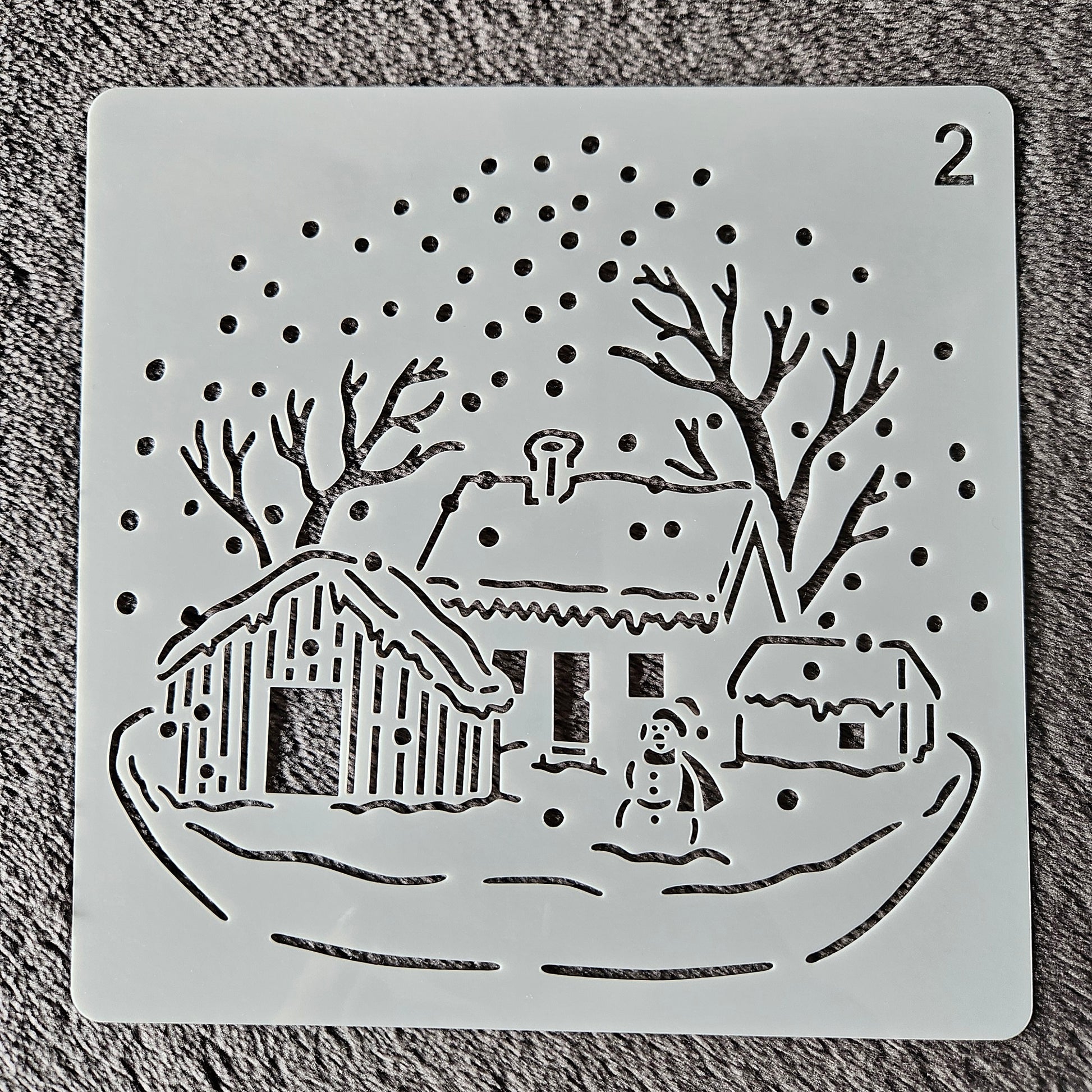 Hobby stencil kerst huisjes in de sneeuw