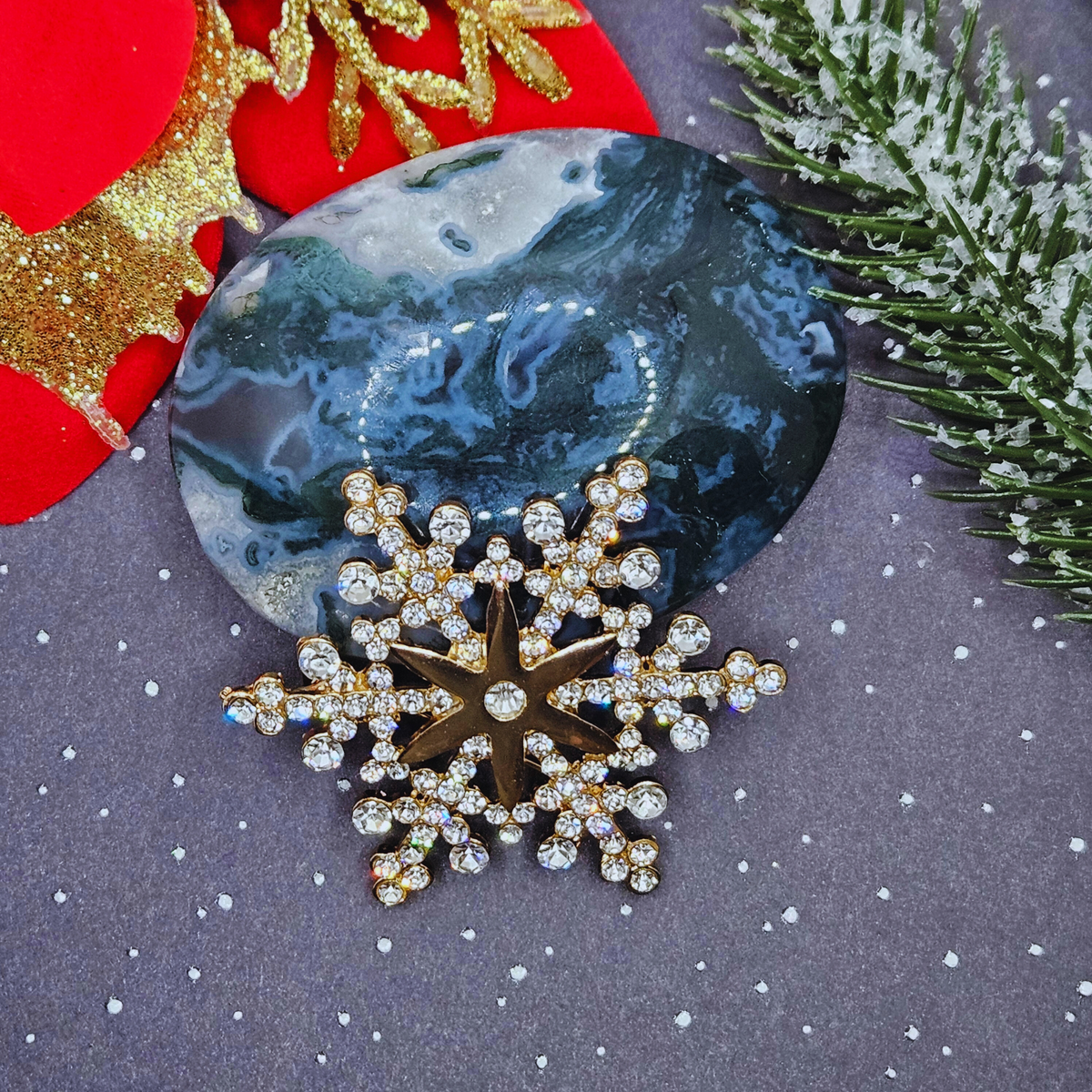 Broche - Sneeuwvlok met ster - goud
