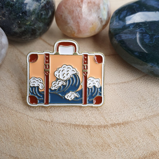 Enamel pin koffer met golf