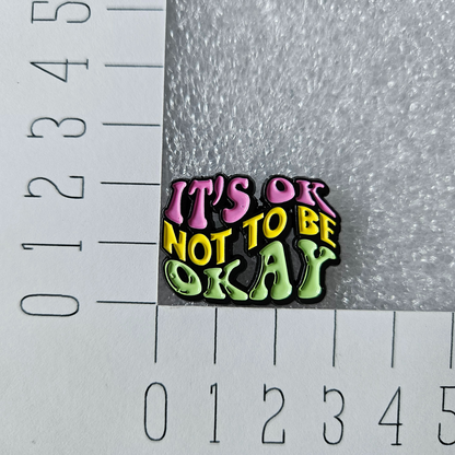 Enamel pin it's ok not to be okay afmeting