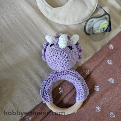Rammelaar - Dino op houten ring - Paars - Hobby en meer  